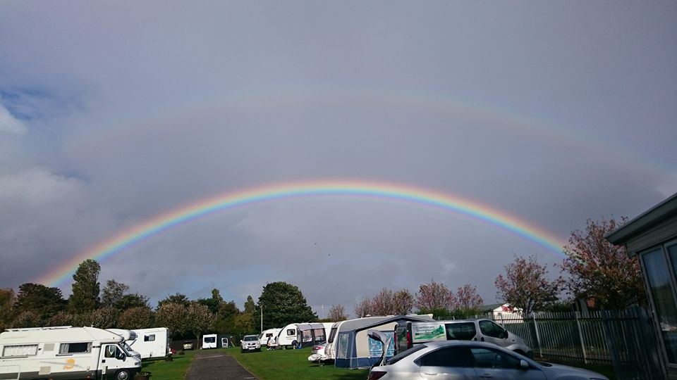 Caravans under a rainbow