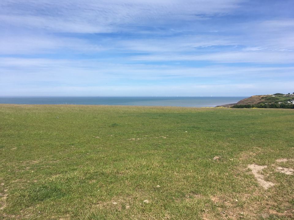 Camping field looking to the sea