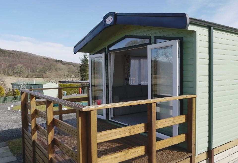 Caravan with decking and awning