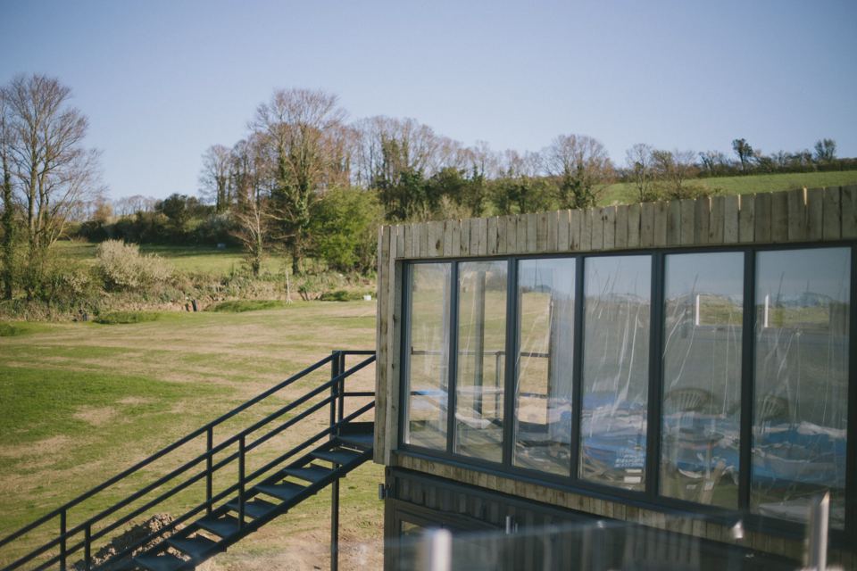Glass-fronted cabin on the grass