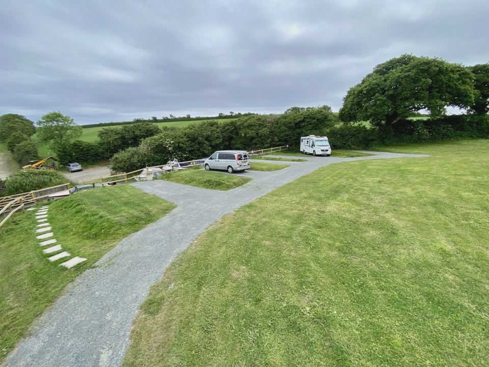 Campervans on the gravel drive