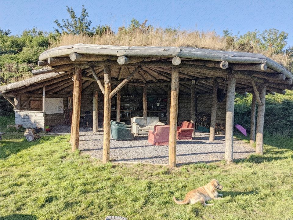 Grass-roofed round house