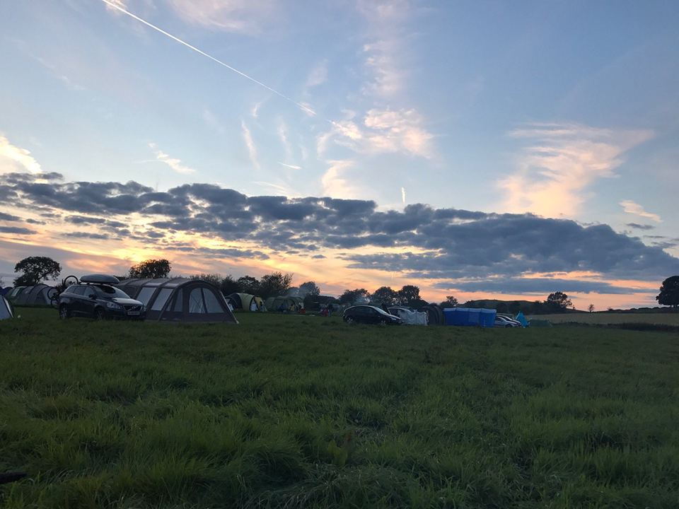 Camping field at sunset