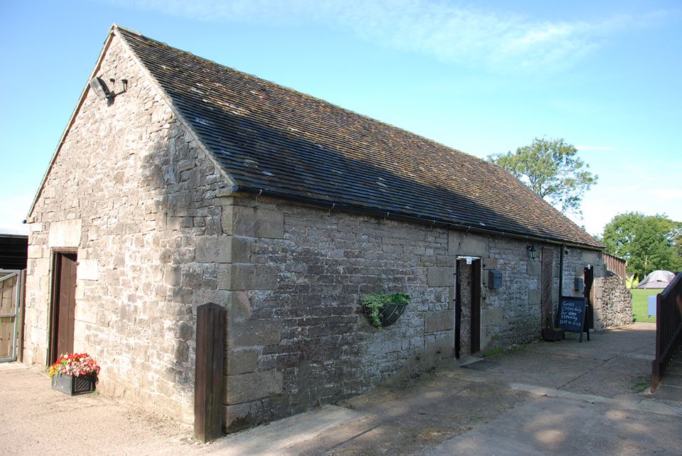 Stone barn with the toilets