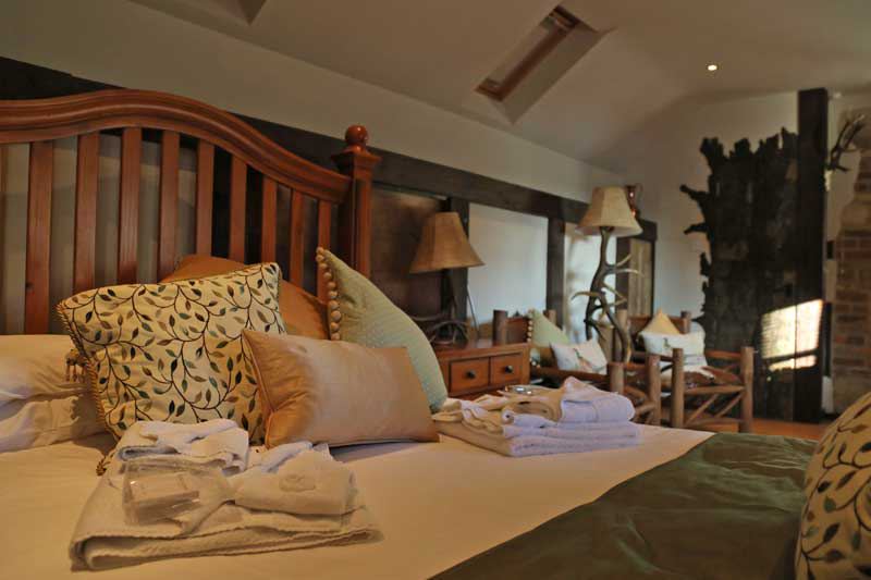 Bedroom with wooden headboard