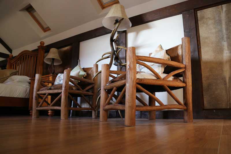 Lodge bedroom with log furniture