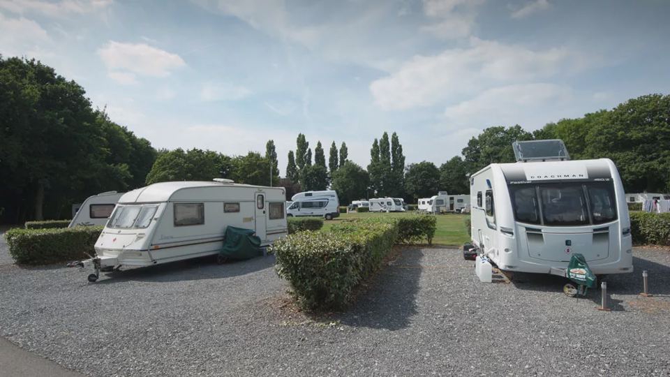 Gravel pitches with hedges