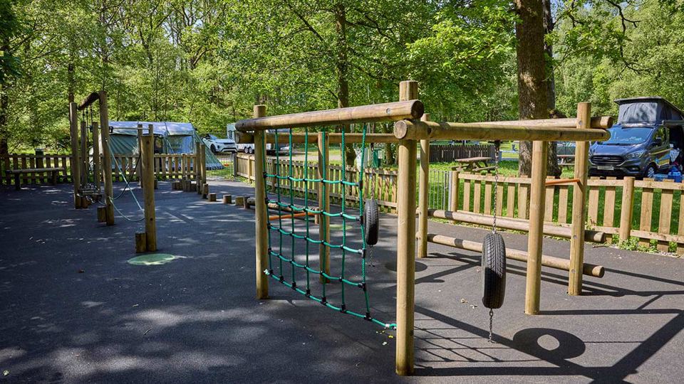 Play area with climbing frame