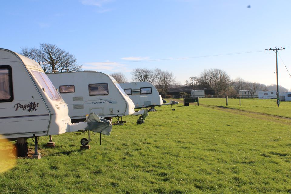 Caravans along the field