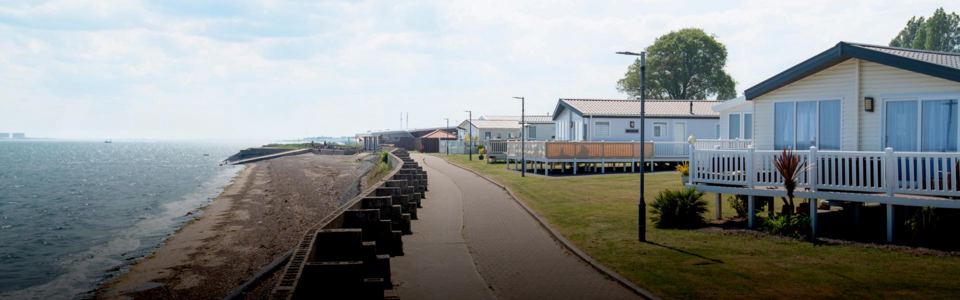 Sea wall path past the lodges