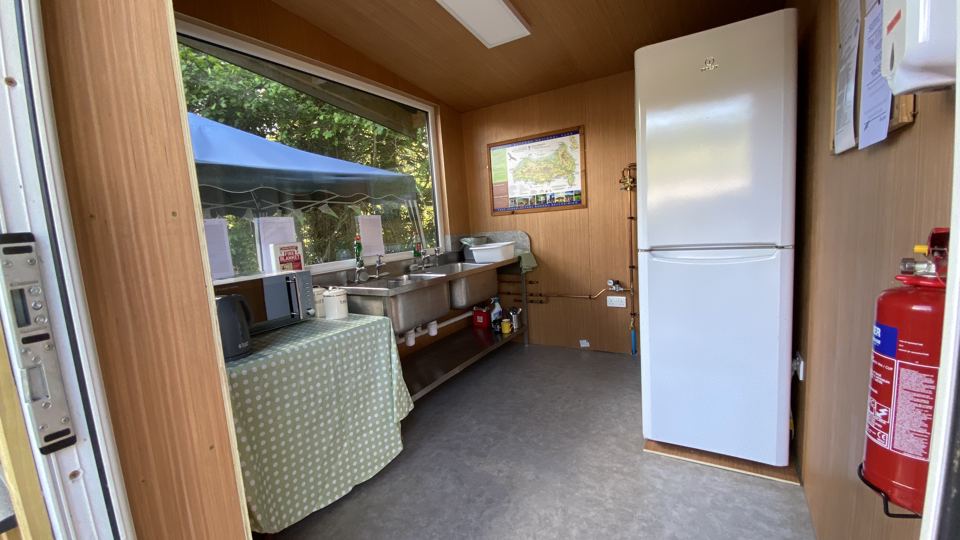 Camp kitchen with fridge-freezer