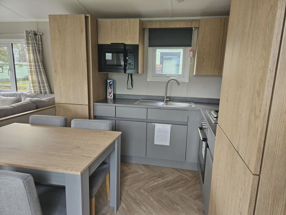Compact kitchen with dining table