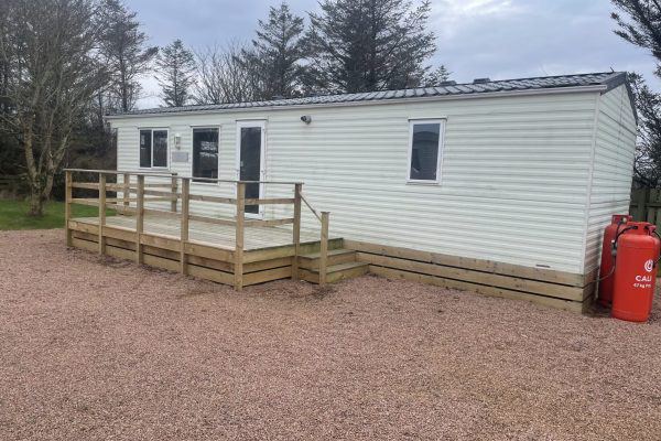 Static caravan with decking