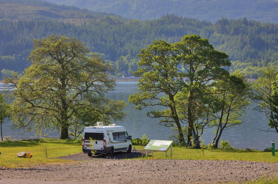 Campervan under the trees