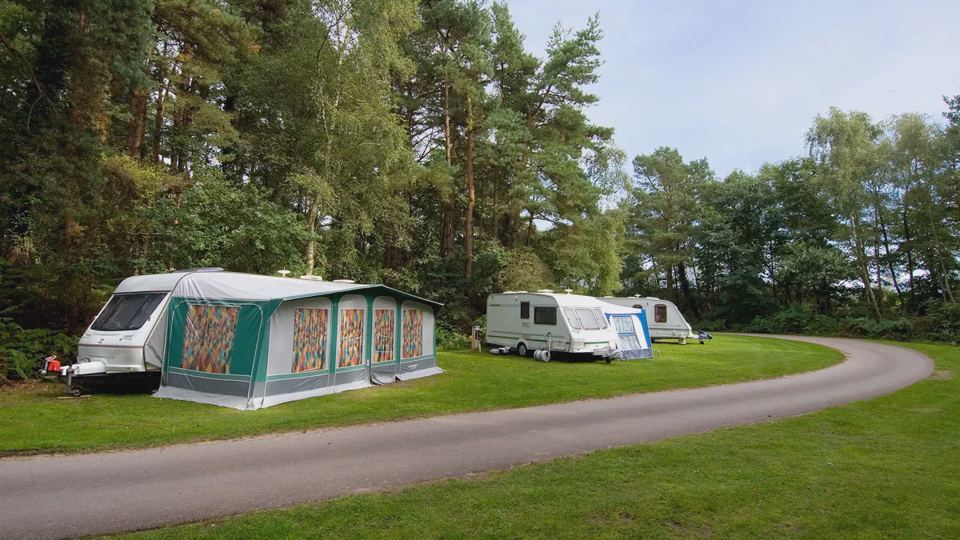 Caravan with awning by the road