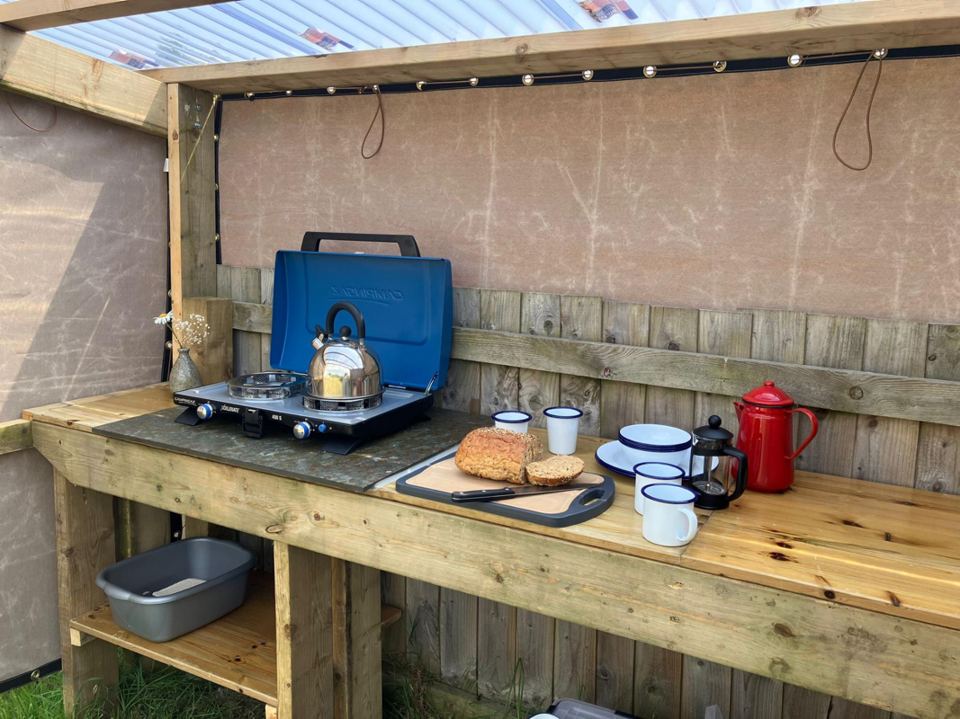 Outdoor kitchen with camping stove