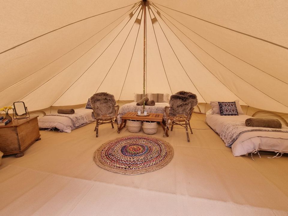 Inside the bell tent with chairs