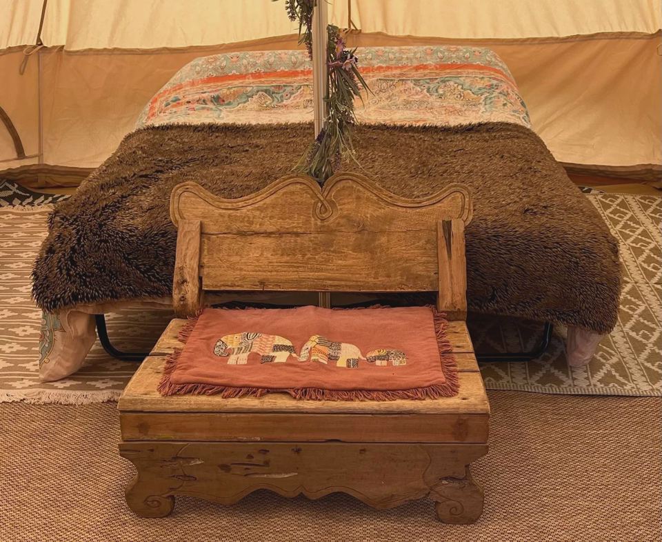 Bed inside the bell tent