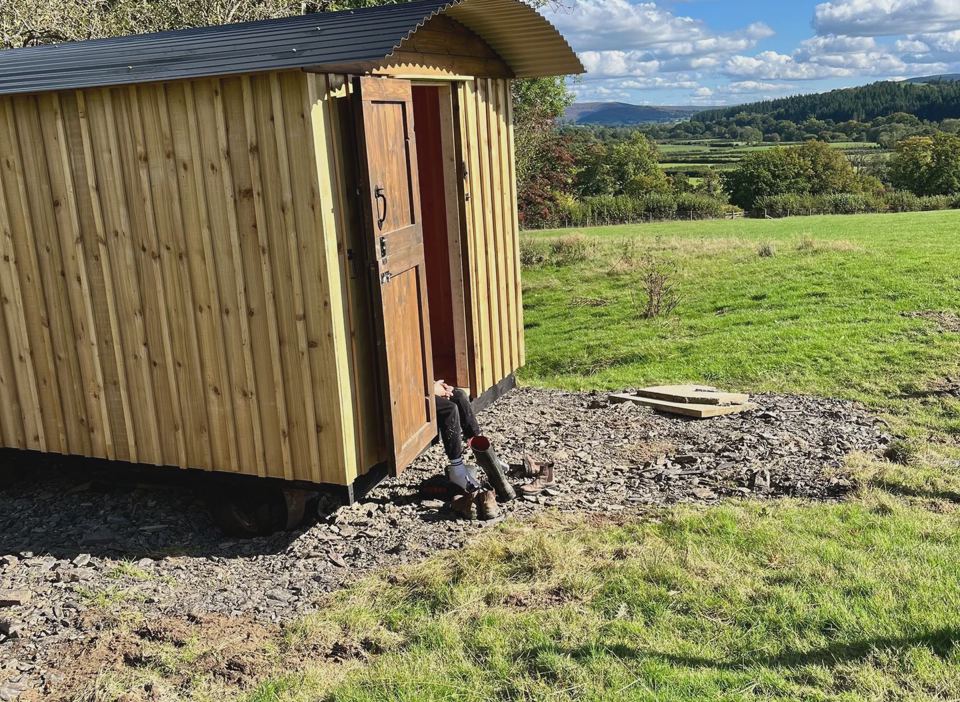 Shepherd's hut and valley view
