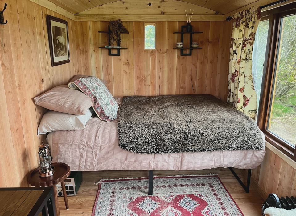 Bed inside the shepherd's hut