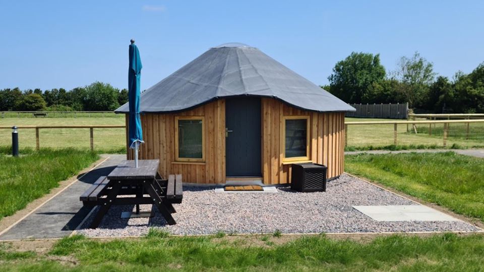 Timber pod with picnic bench