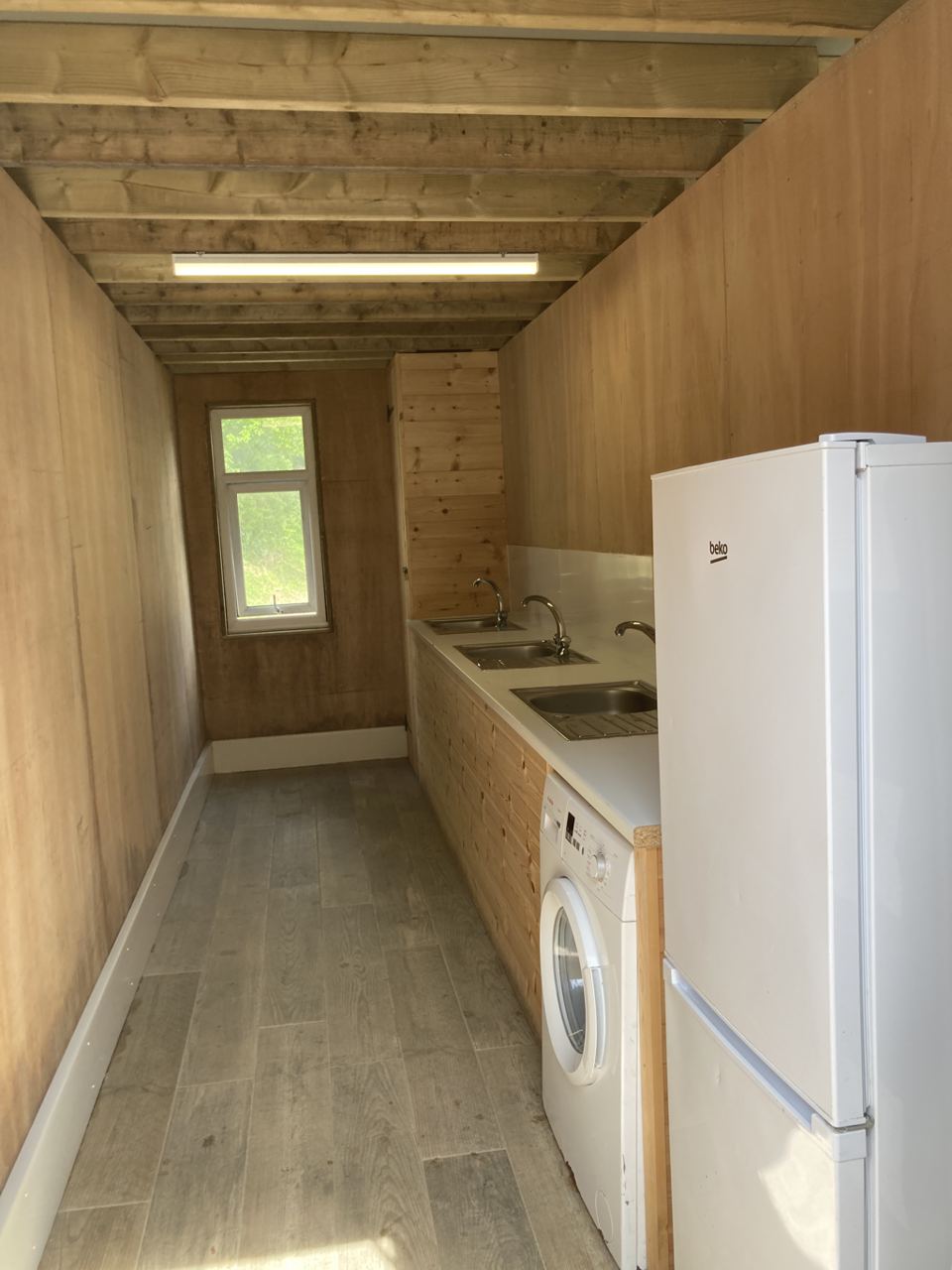 Laundry room with washing machine