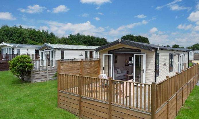 Caravan with fenced decking