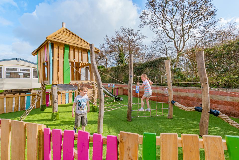 Children's play area with climbing frame