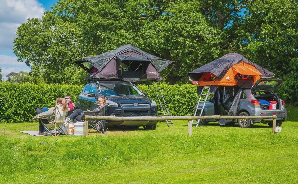 Rooftop tents on grass pitches