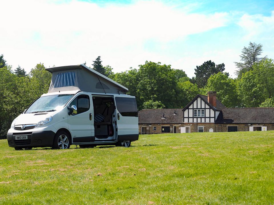 Campervan beside the house