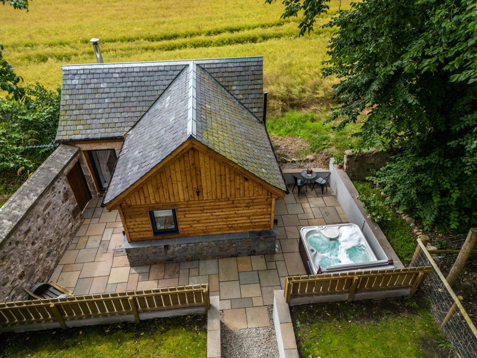 Smokehouse with hot tub
