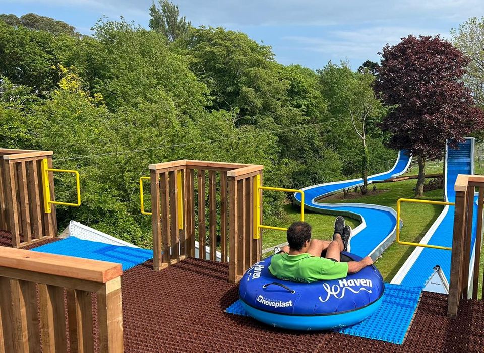 Tube slide in a grassy area