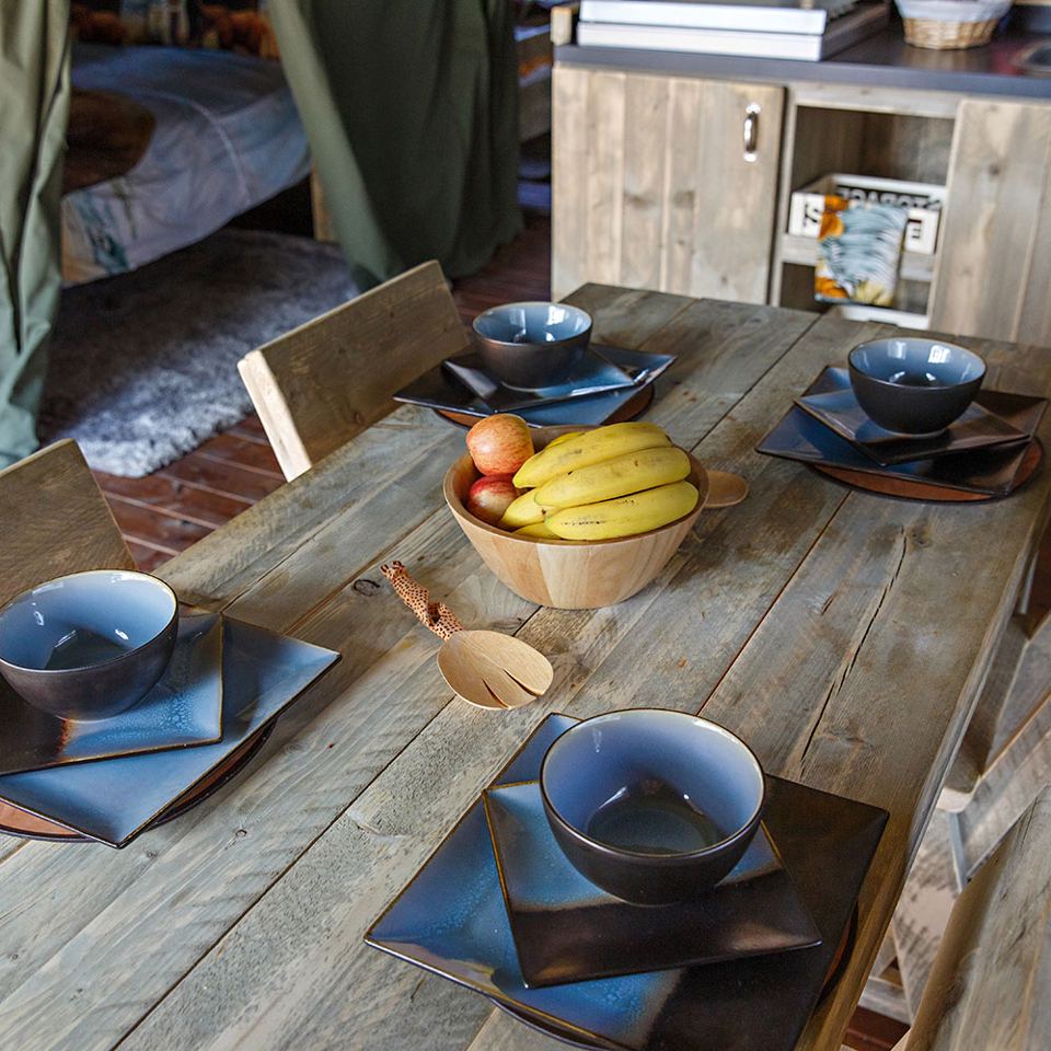 Dining table and bunk beds in a safari tent