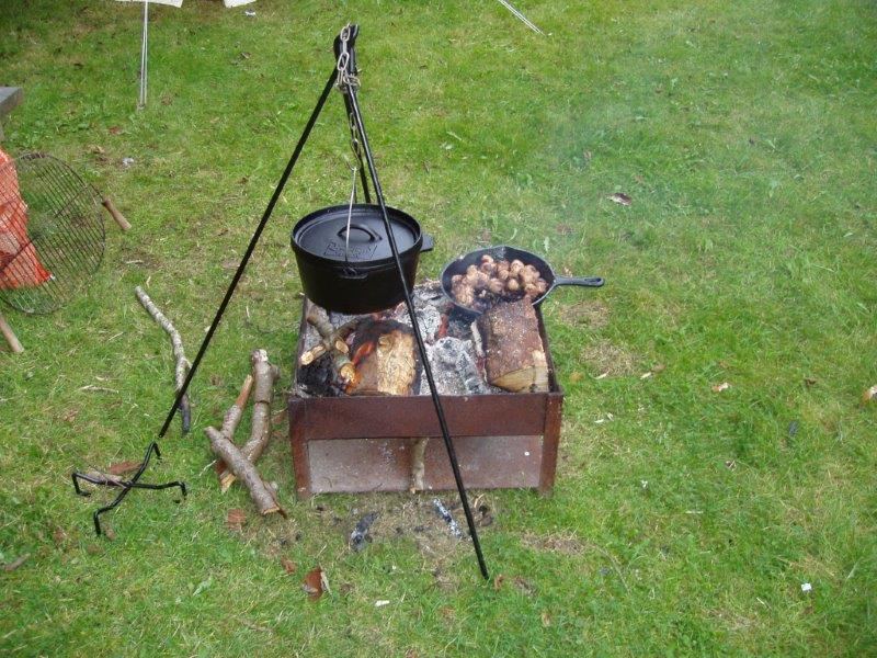 Cooking on a firebox with a tripod