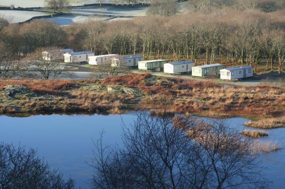 Static caravans above the lake