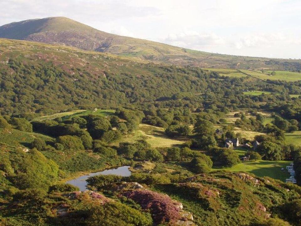 Valley and lake below the hills
