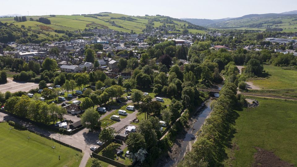 Aerial view of site beside the town