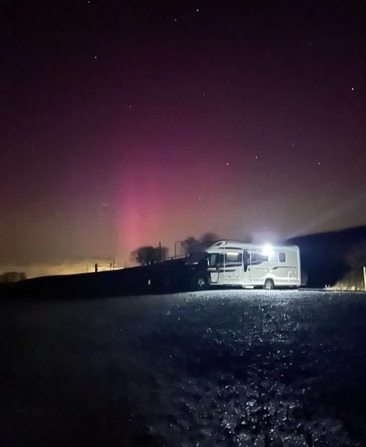Motorhome under the northern lights