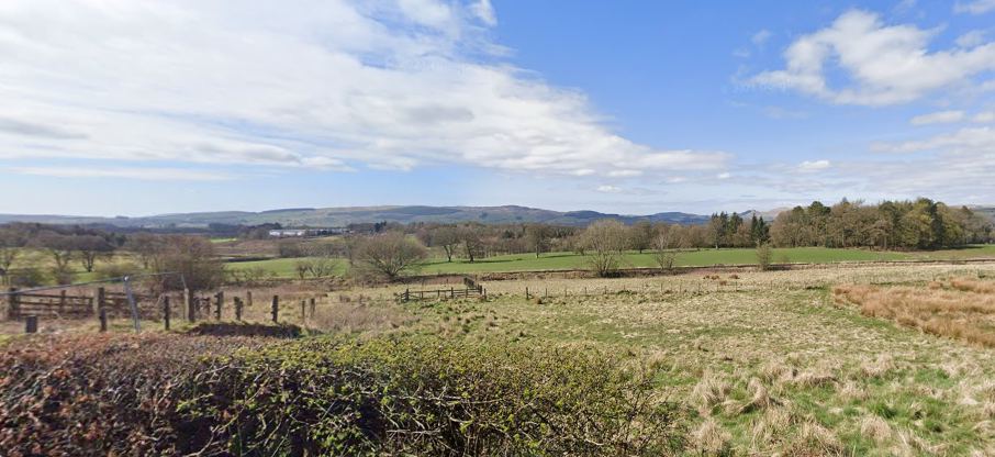 Open fields towards the hills