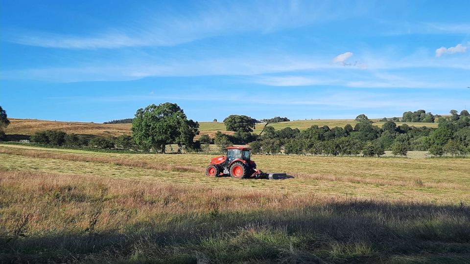 Hay field with tractor