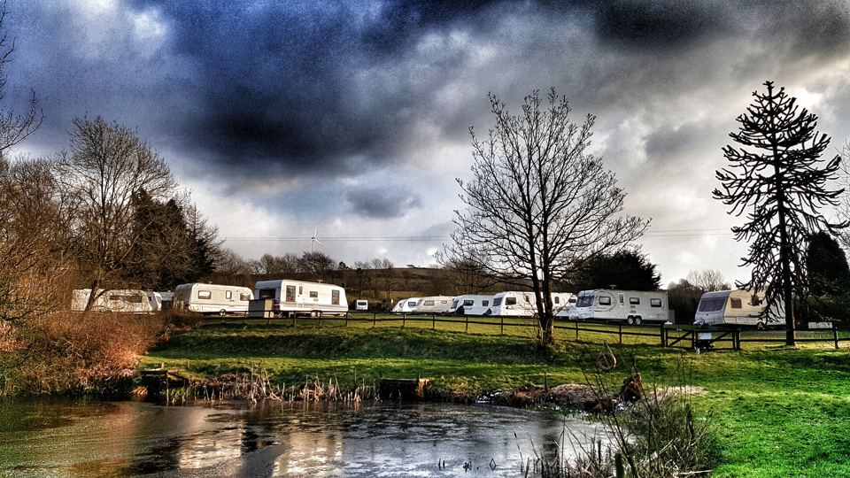 Touring caravans beside the lake
