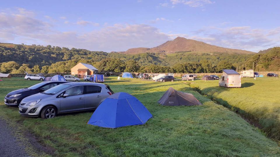 Tents on the riverside field