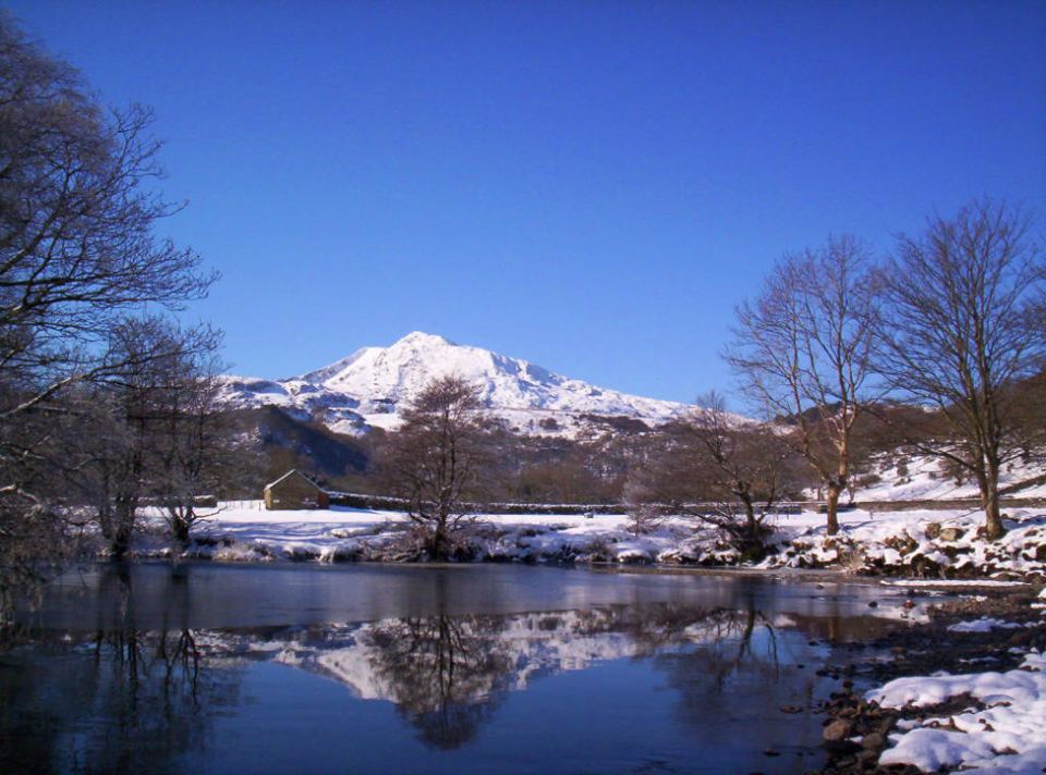 Moel Siabod in snow across the river