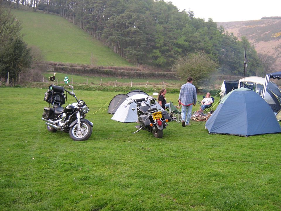 Tents and motorbikes on the grass