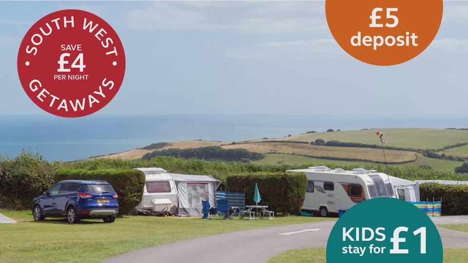 Caravans on the field with sea view