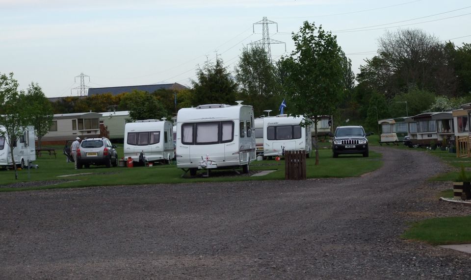Touring pitches along the gravel road