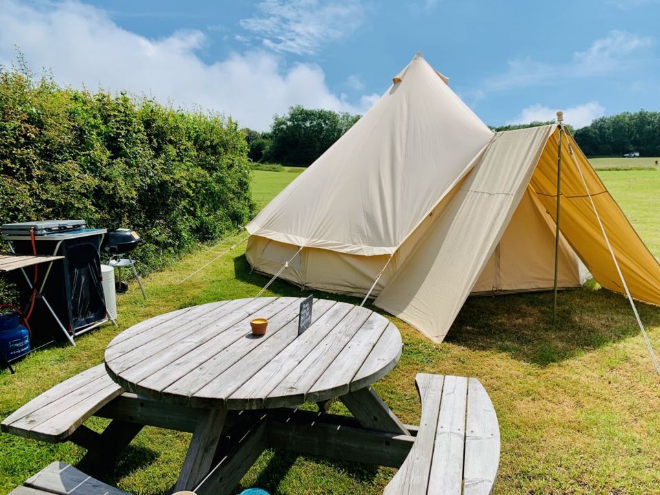 Bell tent with picnic table