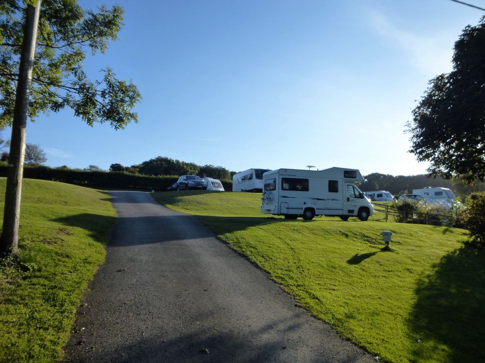Caravan pitches along the farm track