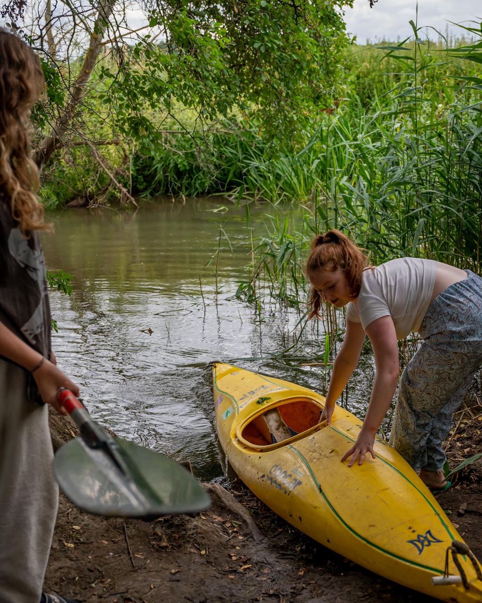 Launching a kayak on the river