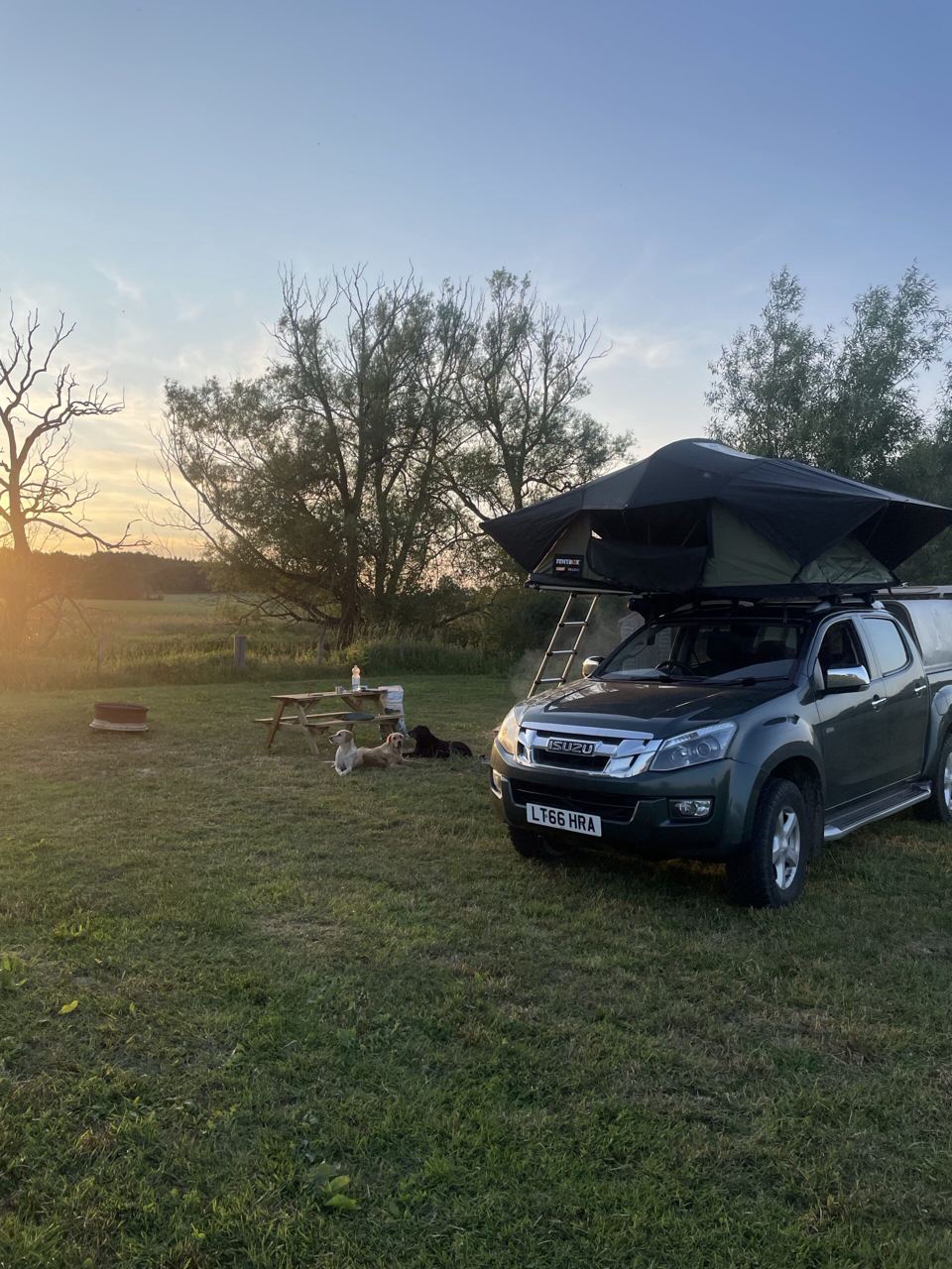 Rooftop tent at sunset